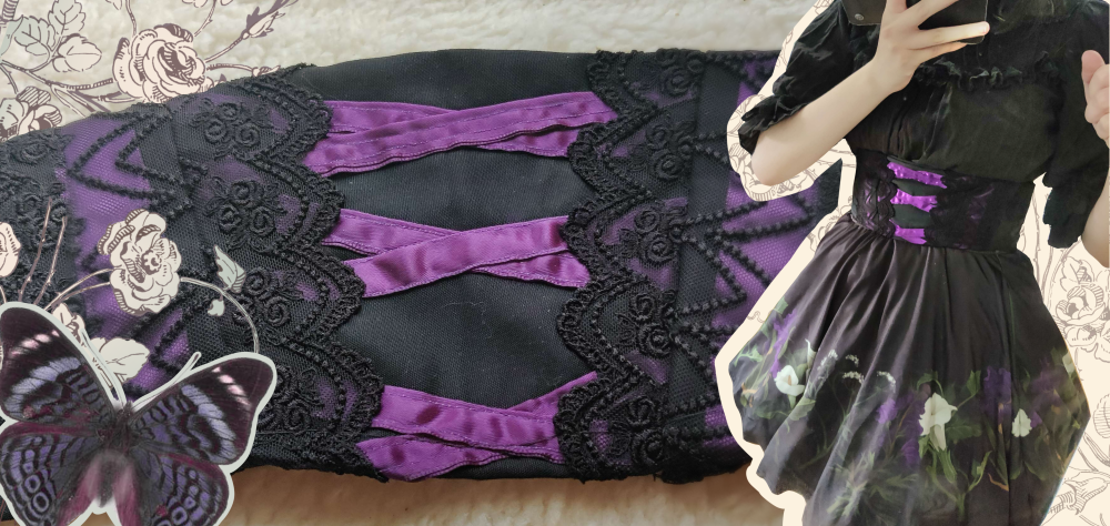 A black underbust corset with purple ribbon decorations and black lace