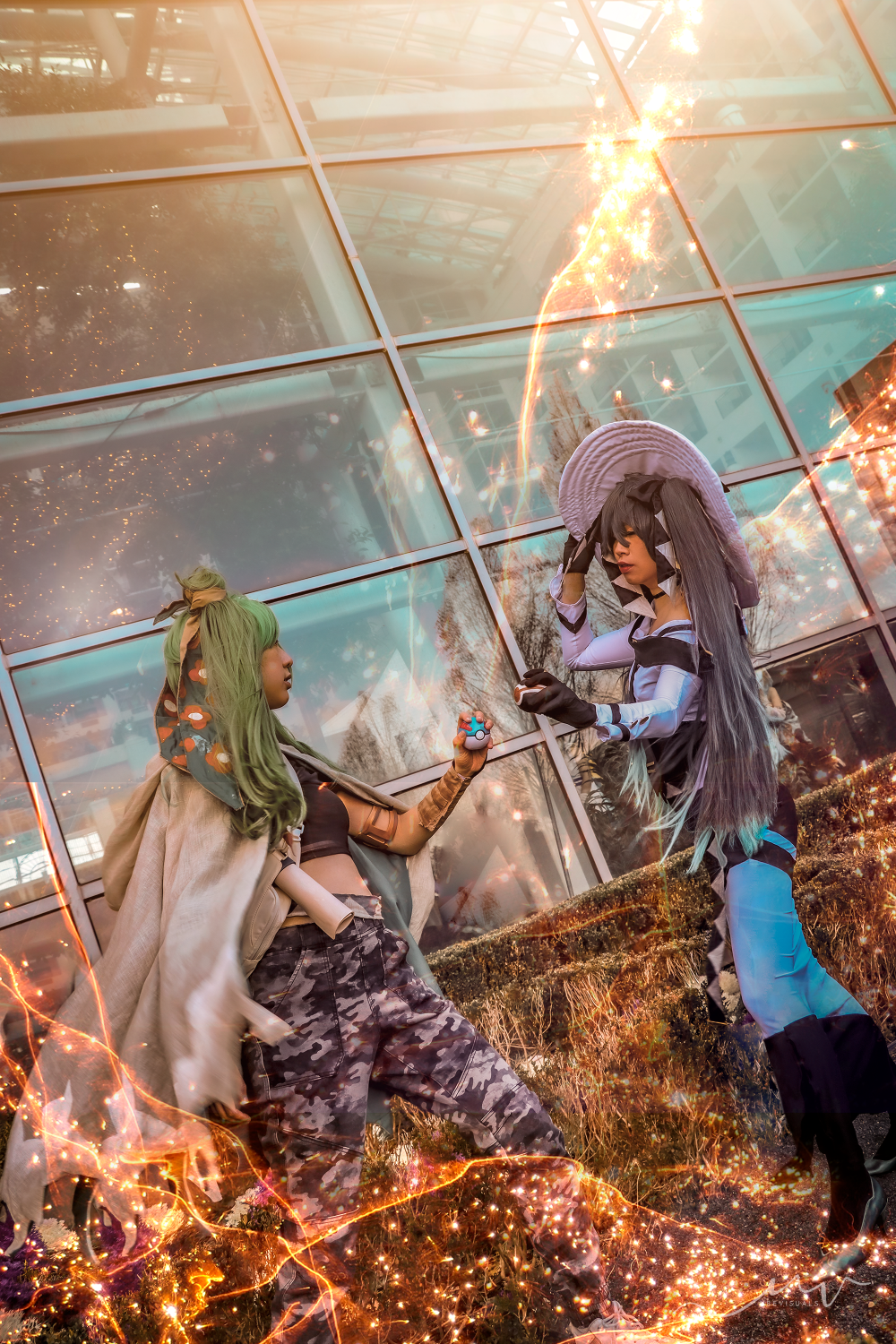Two Project Voltage Miku cosplayers (ground and dark) facing off in a battle, with fire effects.